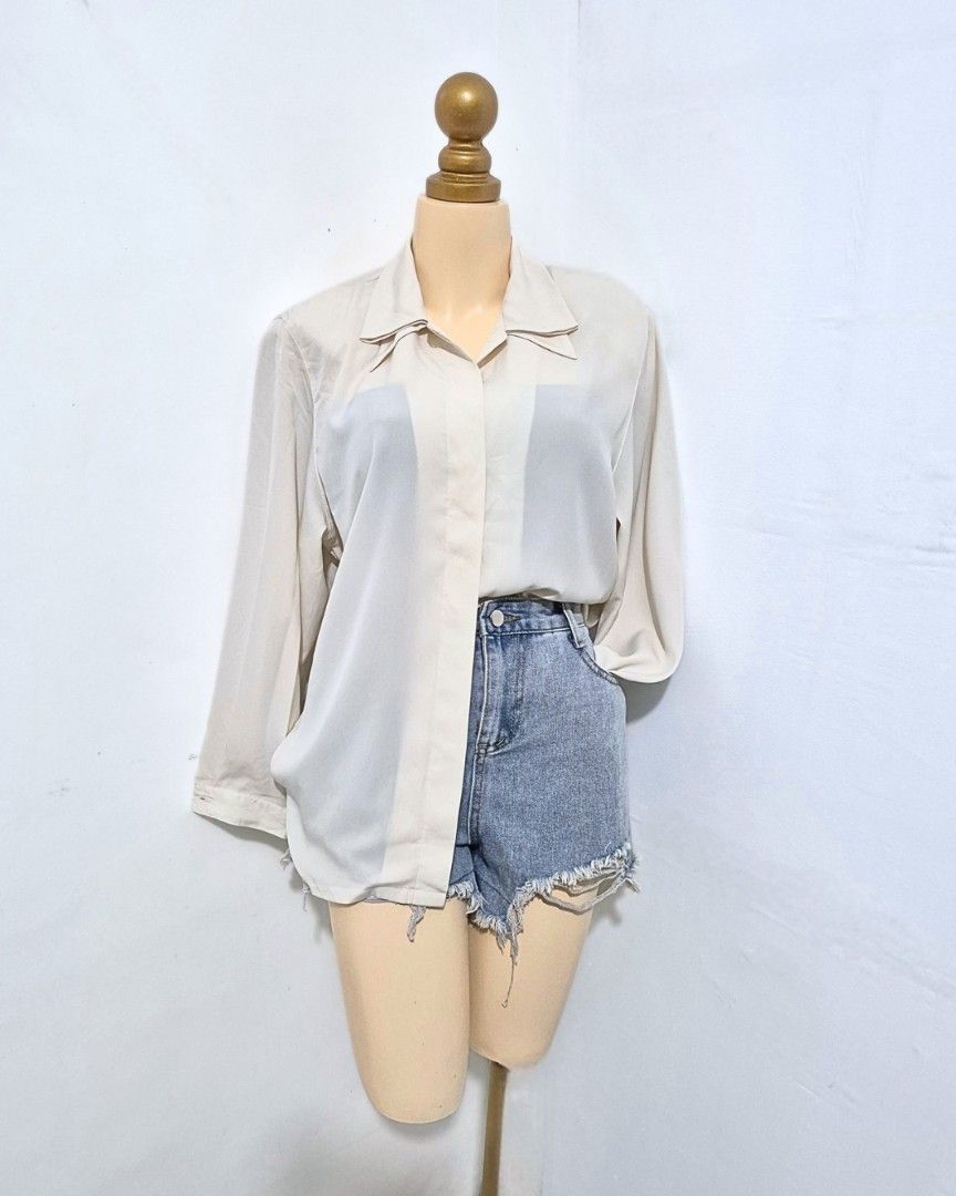 Cream Collared Blouse with Shoulder Pads | L–XL (Category: Longsleeves) located in Cabanatuan. Submitted by _erboutique (Listing ID 1466674640, Image 3). Description: • Soft cream flowy blouse — elegant & effortless ✨ • Collared neckline, subtle shoulder pads for structure • Relaxed fit, lightweight fabric • Size L–XL | Shoulder 17" | Bust 46" | Length 26" • Great condition, easy to dress up or down.