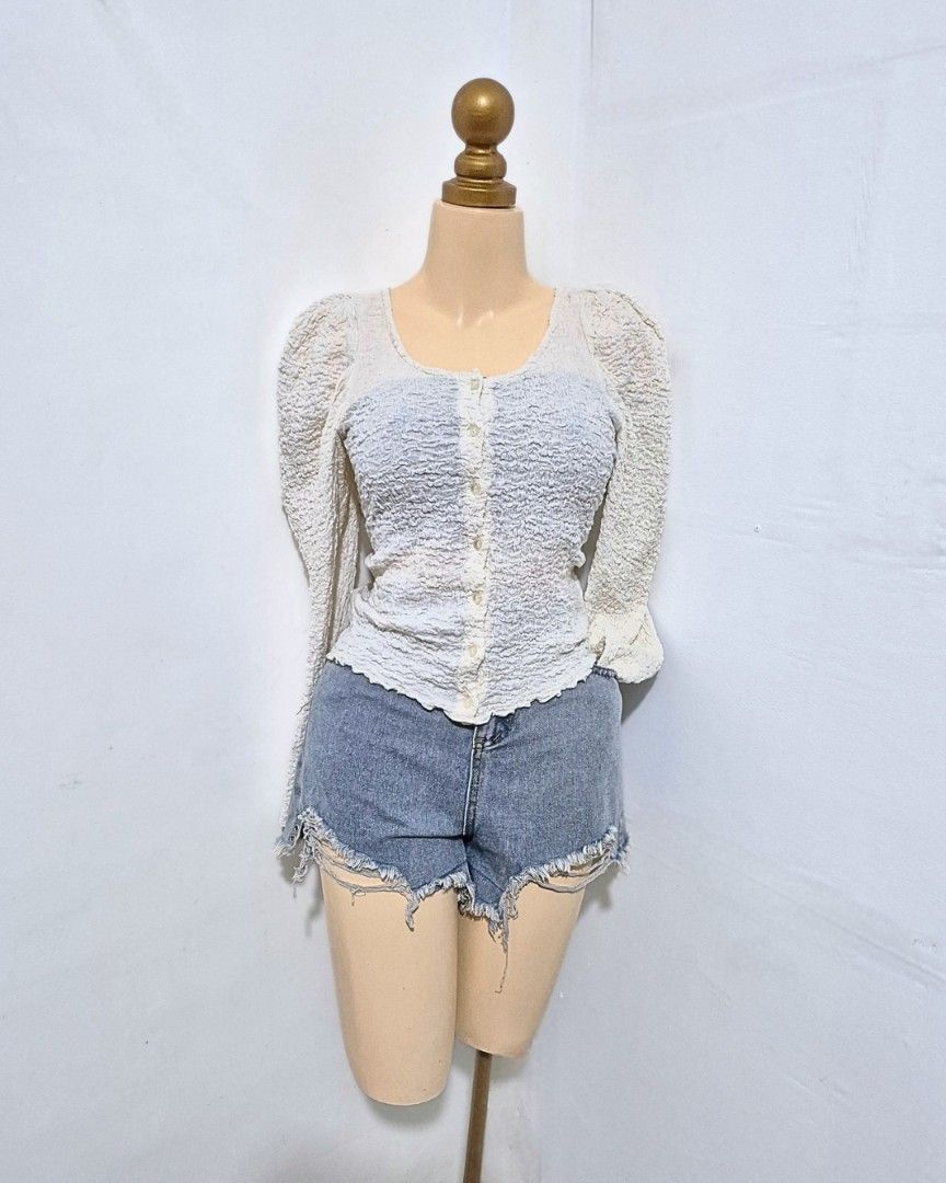 Cream Textured Puff Sleeve Top | S-M (Category: Longsleeves) located in Cabanatuan. Submitted by _erboutique (Listing ID 1466673721, Image 3). Description: • Cream textured top with puff sleeves — so cute & feminine 🤍 • Button front, stretchy smocked fabric, fitted silhouette • Size S–M | Shoulder 13" | Bust 34–36" | Length 21" • Great condition, comfy & easy to wear.