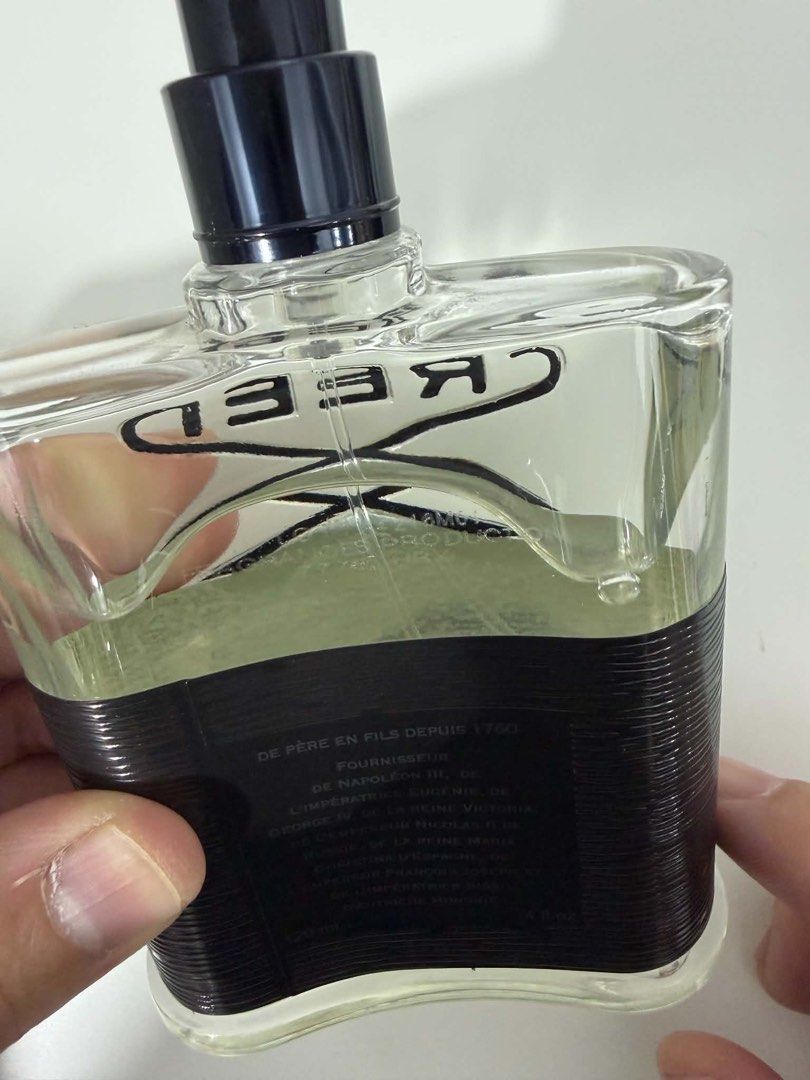 Creed Aventus Eau de Parfum 120ml (Category: Fragrance & Deodorants) located in Cavite. Submitted by emeged (Listing ID 1466634230, Image 3). Description: - Authentic Creed Aventus fragrance - Generous 120ml (4 fl oz) bottle size - Signature black cap featuring the embossed crest logo - Distinctive textured black grip wrap around the lower half - Etched batch number and details near the upper glass neck - Smooth spray nozzle under the cap - Perfe