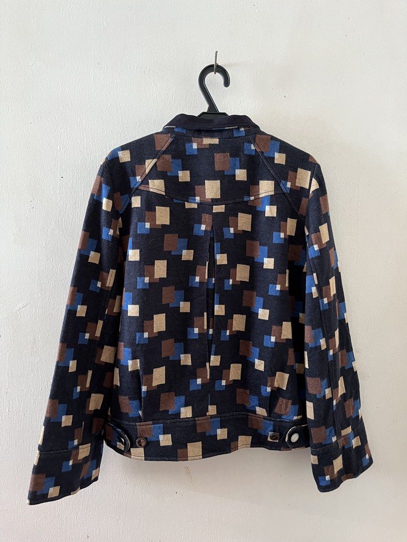 Crocodile Ladies Geometric Pattern Button Jacket (Category: Coats, Jackets and Outerwear) located in Cebu City. Submitted by purgemycloset (Listing ID 1466634889, Image 2). Description: - Brand: Crocodile Ladies - Color: Dark navy blue with brown and blue geometric pattern - Size: 95 (49) - Material: Textured outer fabric with smooth black lining - Closure & Details: Front button closure, branded metallic buttons, cuff and side hem button details