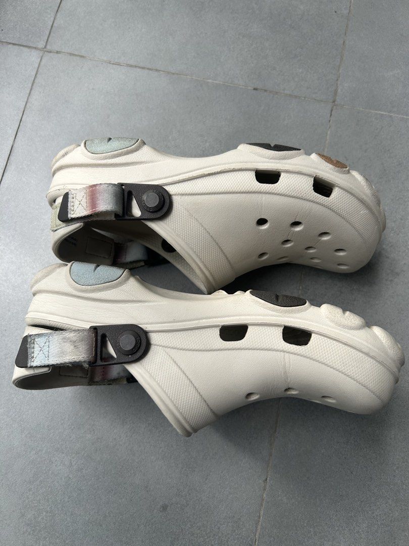 Crocs All Terrain Clog Bone Multi (Category: Slippers & Slides) located in Makati City. Submitted by racarbon (Listing ID 1466755926, Image 3). Description: - Model: Crocs All Terrain Clogs - Color: Bone - Size: Men's 6 / Women's 8 - Features: Adjustable strap with patterned webbing and rugged sole with rubber pods for extra grip - Condition: Uppers are clean, with normal signs of wear on the bottom tread.