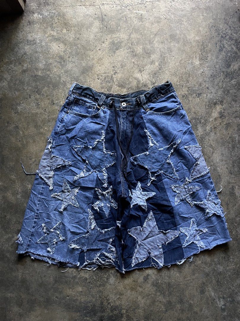 Custom Star Patch Denim Shorts (Category: Shorts) located in M'Lang. Submitted by thriftnikulot1.0 (Listing ID 1460112982, Image 2). Description: - Unique denim shorts - All-over custom star patches - Frayed hem for a distressed look - Ideal for festivals and casual wear - A true statement piece.