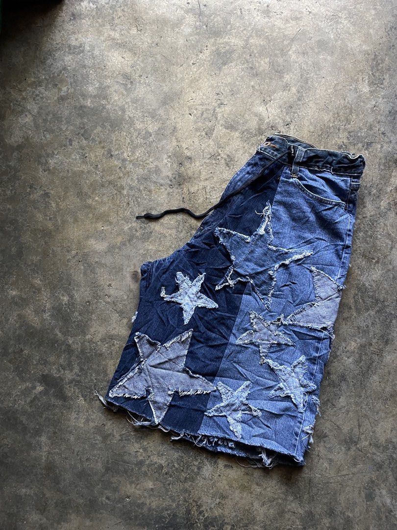 Custom Star Patch Denim Shorts (Category: Shorts) located in M'Lang. Submitted by thriftnikulot1.0 (Listing ID 1460112982, Image 3). Description: - Unique denim shorts - All-over custom star patches - Frayed hem for a distressed look - Ideal for festivals and casual wear - A true statement piece.