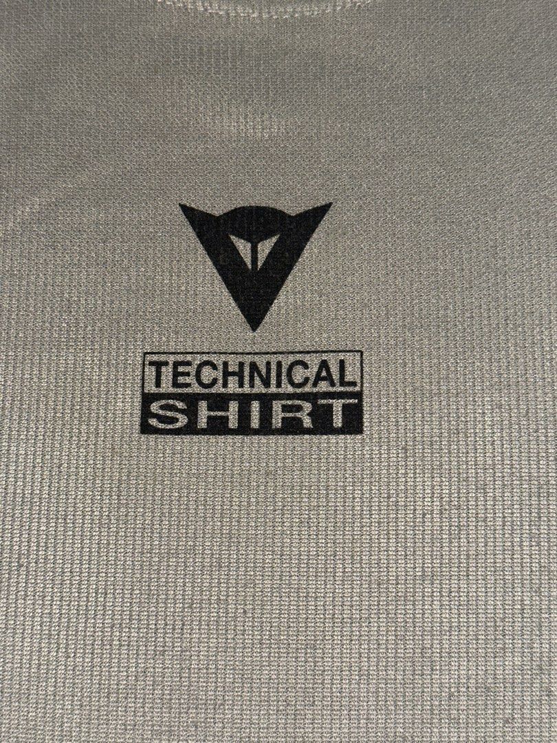 Dainese Technical Shirt Coolmax Grey (Category: Tshirts & Polo Shirts ) located in Quezon City. Submitted by mancave_stuff (Listing ID 1466565624, Image 2). Description: - Brand: Dainese -Size M: W18” x L24” soft & stretchy - Color: khaki grey - Material: 100% polyester Coolmax (breathable and quick-dry) - Design: Short sleeves, round neck, chest logo print - Origin: Made in Romania - Condition: Excellent / Great for riding or outdoor activities 