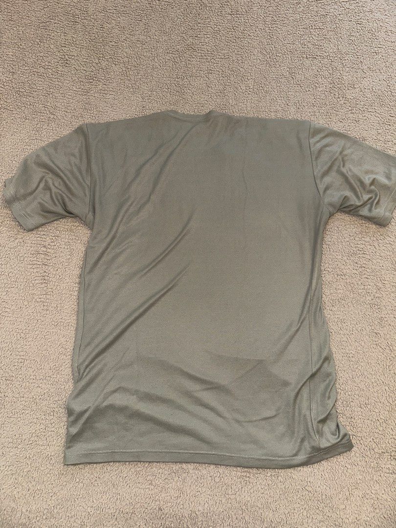 Dainese Technical Shirt Coolmax Grey (Category: Tshirts & Polo Shirts ) located in Quezon City. Submitted by mancave_stuff (Listing ID 1466565624, Image 3). Description: - Brand: Dainese -Size M: W18” x L24” soft & stretchy - Color: khaki grey - Material: 100% polyester Coolmax (breathable and quick-dry) - Design: Short sleeves, round neck, chest logo print - Origin: Made in Romania - Condition: Excellent / Great for riding or outdoor activities 