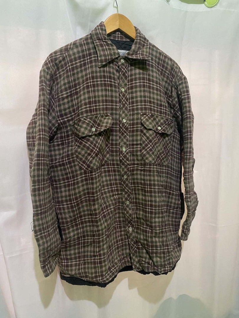 Dakota Quilted Lined Plaid Flannel Shirt Jacket (Category: Coats, Jackets and Outerwear) located in Quezon City. Submitted by elihur.tuazon (Listing ID 1466611101, Image 3). Description: - Color/Pattern: Green and brown plaid - Closure: Button-up front with snap buttons - Pockets: Two chest pockets - Lining: Quilted black inner lining for extra warmth - Material: 100% polyester fibres, heavyweight winter piece - Origin: Made in China.