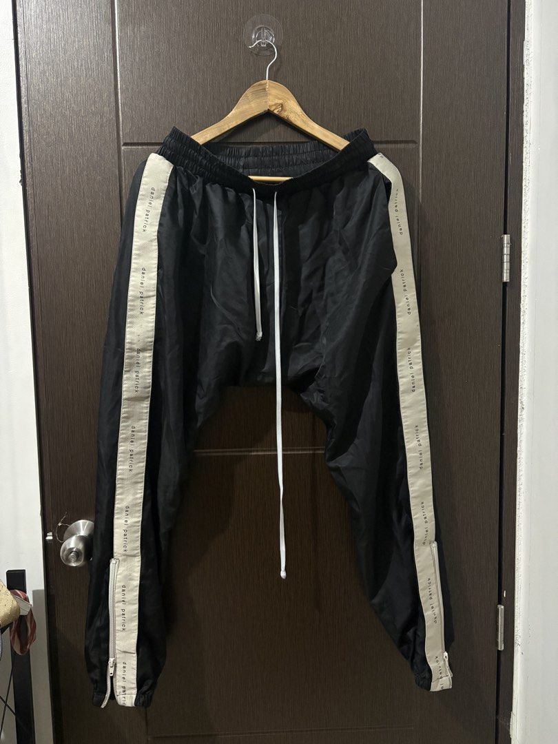 DANIEL PATRICK SIDE TAPE JOGGER PANTS (Category: Joggers) located in Naga. Submitted by archivedseller (Listing ID 1466656638, Image 1). Description: -9/10 Condition -sign of wear -size m on tag -W 14.5-17.5 INCHES -L 37 INCHES.