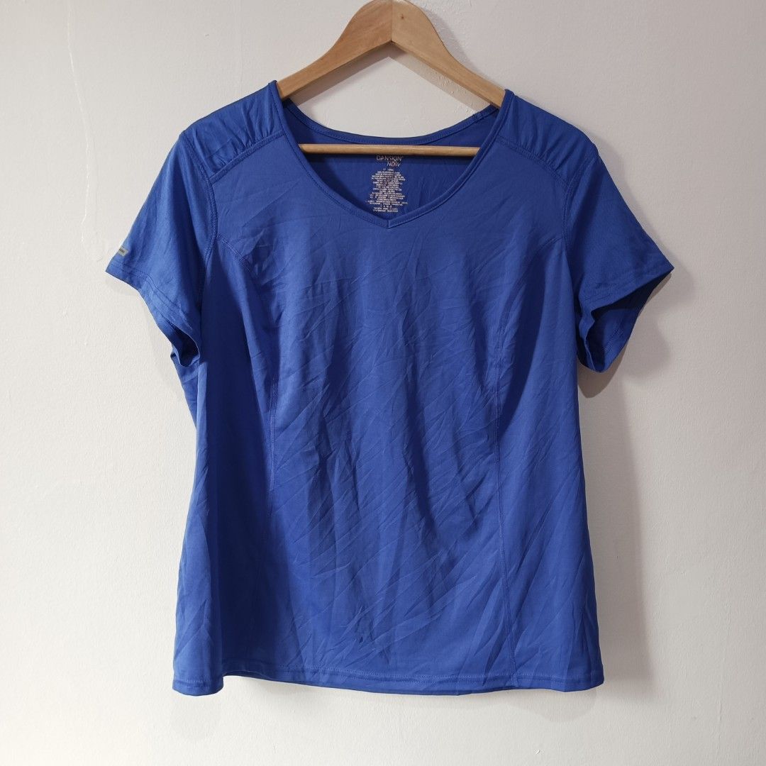 (Danskin Now) Indigo Activewear Top (Category: Activewear) located in Subic. Submitted by mustardt_ (Listing ID 1466615324, Image 1). Description: A short-sleeve, v-neck athletic shirt ruched detail at the shoulder seams and lightweight, moisture-wicking fabric. Size: 21in x 25.5in code: c811.