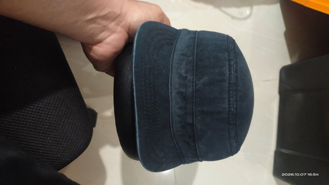 Dark blue military style cadet cap hat (Category: Caps & Hats) located in Manila. Submitted by rhobin.m08 (Listing ID 1466714789, Image 1). Description: - Color: Dark blue - Material: Sturdy cotton twill that holds its shape well - Design: Structured flat top with a curved brim and detailed stitching - Fit: Comfortable for everyday wear and fits standard head sizes.