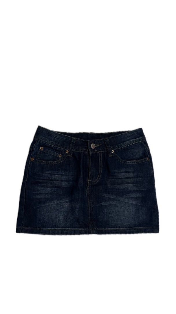 Dark wash denim mini skirt (Category: Skirts) located in Manila. Submitted by ann.b200 (Listing ID 1466643278, Image 1). Description: - Dark wash denim mini skirt - Classic five-pocket styling with button closure and zip fly - Faded whiskering detail across the front - Sturdy denim material featuring contrast stitching - Versatile piece, easy to match with casual tees and hoodies.