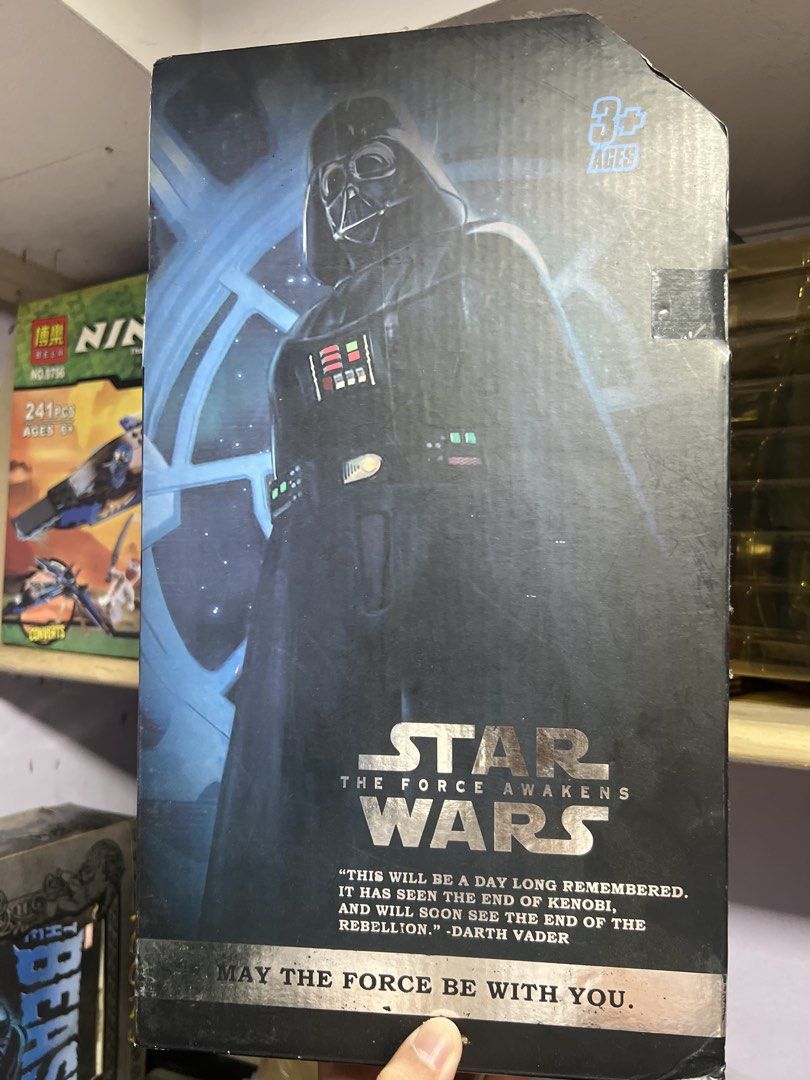 Darth Vader Star Wars The Force Awakens (1:6 Scale) (Category: Figurines & Statues) located in Quezon City. Submitted by thegroovearchive (Listing ID 1466680027, Image 2). Description: - Bootleg 1:6 Star Wars Darth Vader action figure - Comes in original packaging featuring iconic quotes from Darth Sidious and Darth Vader - Detailed design including his signature black suit, flowing cape, and helmet - Recommended for ages 3 and up - Note: Box sho