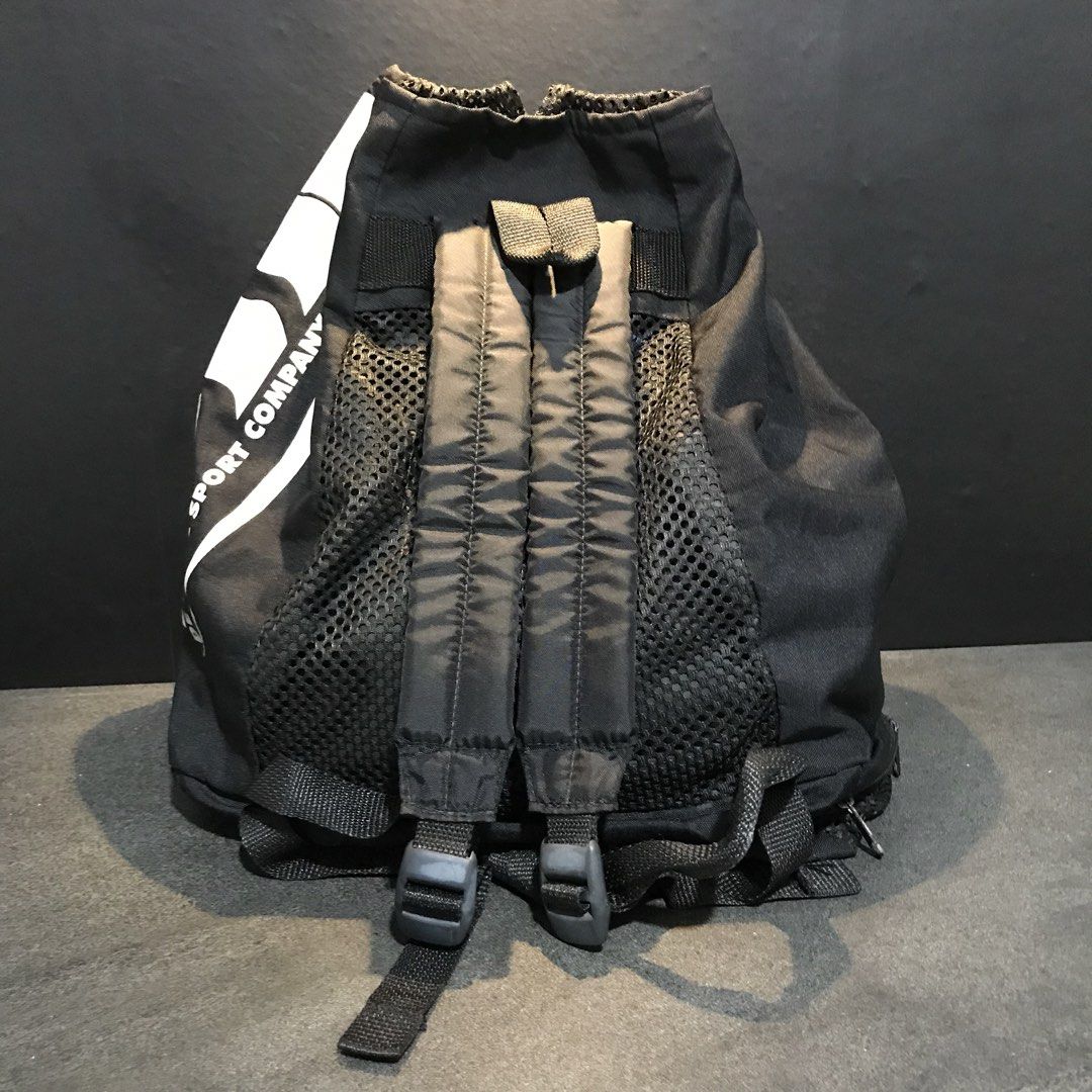 De Soto Sport Company Drawstring Backpack Black (Category: Backpacks) located in Baao. Submitted by all.things.japan (Listing ID 1466712824, Image 3). Description: 17.0 x 11.0 x 14.0 inches - Brand/Model: De Soto Sport Company drawstring backpack - Color: Black with a big white logo on the side - Storage: Main compartment, front zippered pocket, front mesh pouch, and extra bottom compartment - Comfort & Breathability: Adjustable shoulder straps a