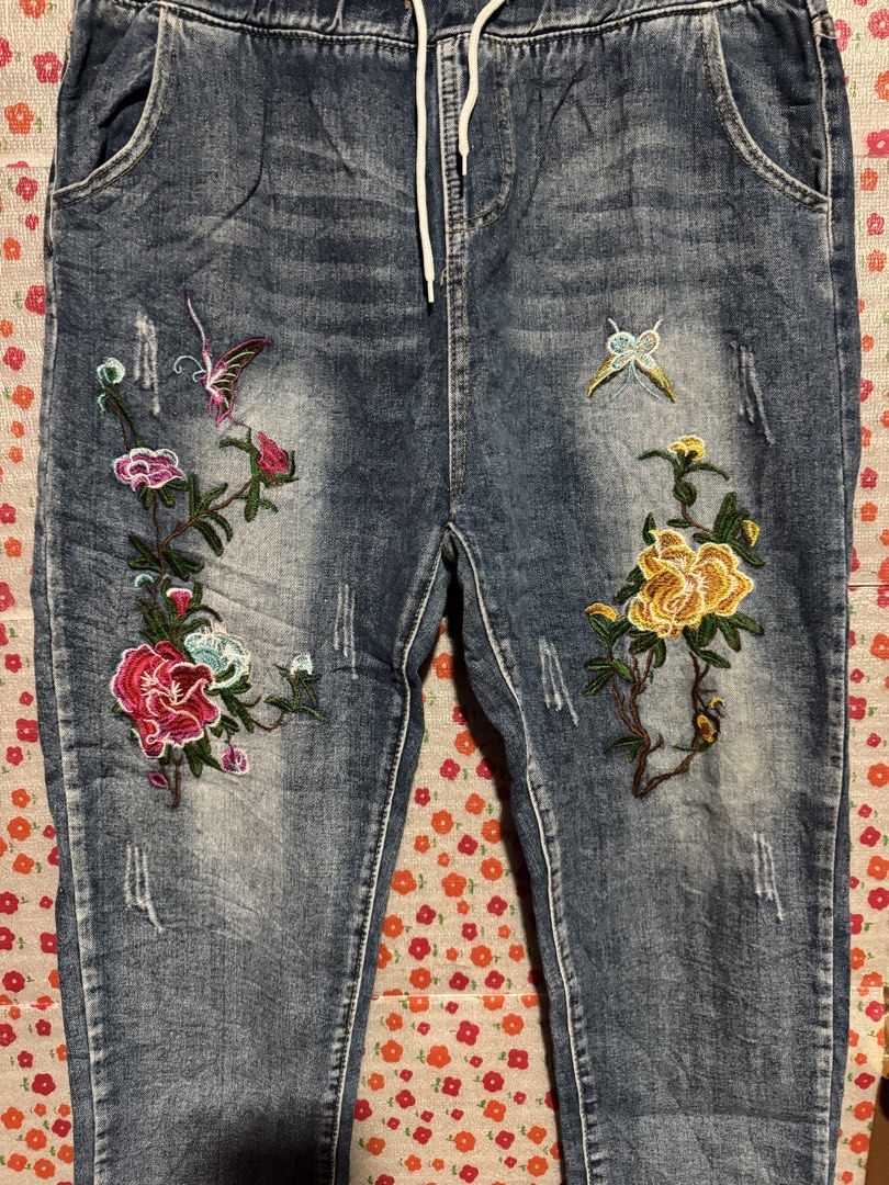 Denim pants with embroidered design (Category: Jeans) located in Bacoor. Submitted by teneleven_apparel (Listing ID 1466717106, Image 3). Description: Measurement (based on measure tape): 34-36x 38L Condition: excellent/ need wash Lalamove or jnt only! .