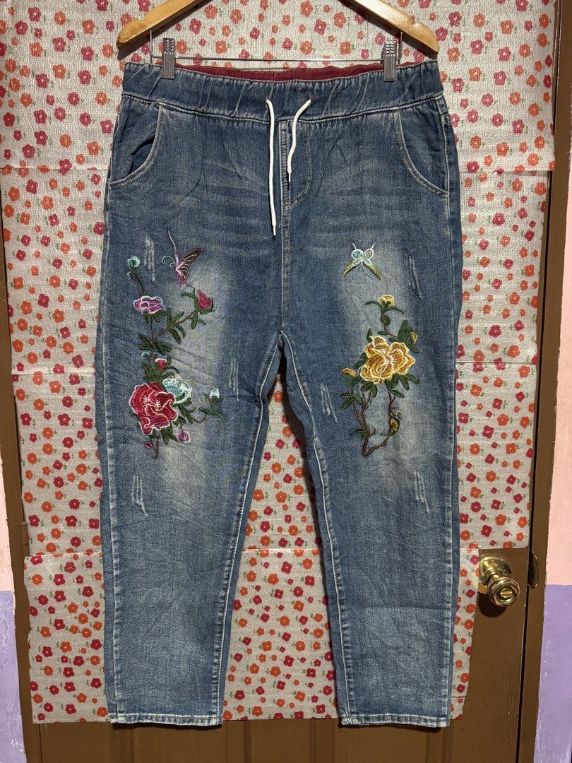 Denim pants with embroidered design (Category: Jeans) located in Bacoor. Submitted by teneleven_apparel (Listing ID 1466717106, Image 1). Description: Measurement (based on measure tape): 34-36x 38L Condition: excellent/ need wash Lalamove or jnt only! .