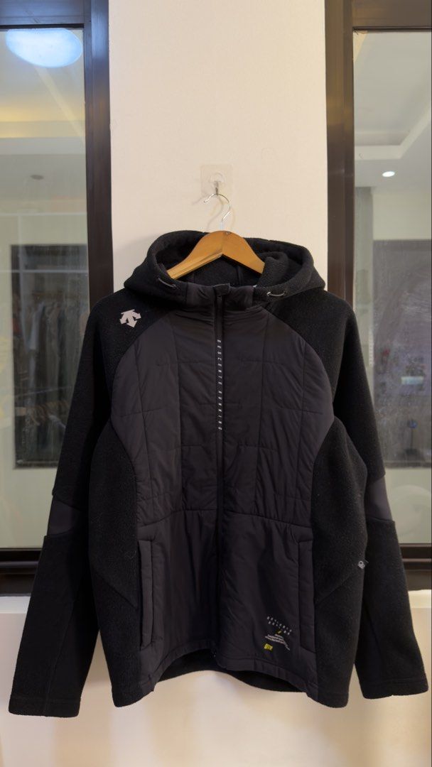 Descente Running Hooded Jacket (Category: Coats, Jackets and Outerwear) located in Paranaque City. Submitted by preluxeshop_ph (Listing ID 1466768422, Image 2). Description: Descente Running Hooded Jacket -Design: Hooded running jacket -Features: Quilted front, fleece sleeves, zip closure, pockets -Condition: 9.8/10 -Dimes: Length: 26.5” Width: 21”.