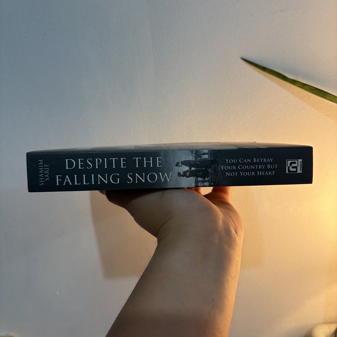 Despite the Falling Snow by Shamim Sarif (Category: Storybooks) located in Manila. Submitted by ajdeclutter (Listing ID 1466579262, Image 2). Description: - Genre: Cold War espionage thriller / Historical fiction - Plot: A secret spy falls in love with a Kremlin official in Moscow, with consequences spanning decades into America - Format: Paperback.