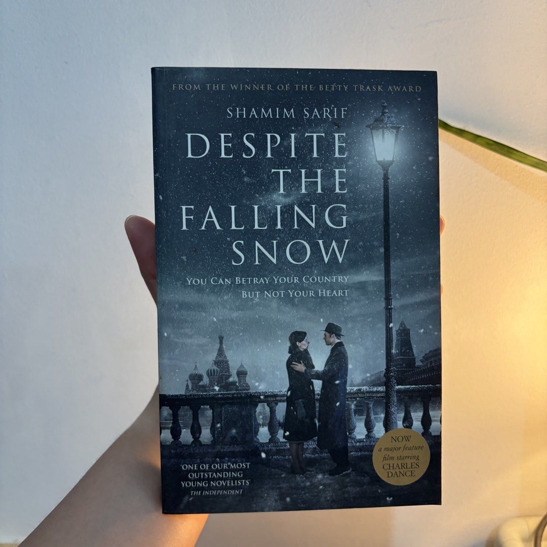 Despite the Falling Snow by Shamim Sarif (Category: Storybooks) located in Manila. Submitted by ajdeclutter (Listing ID 1466579262, Image 1). Description: - Genre: Cold War espionage thriller / Historical fiction - Plot: A secret spy falls in love with a Kremlin official in Moscow, with consequences spanning decades into America - Format: Paperback.