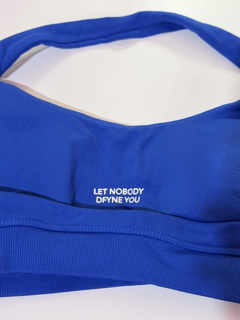 DFYNE Impact Set in Electric Blue (Category: Activewear) located in Paranaque City. Submitted by moonlightgiraffe (Listing ID 1466566522, Image 3). Description: - Brand: DFYNE - Color: Electric Blue - Authentic - Logo with missing line in “E” accidentally put in dryer - XS - Sucat/BGC .