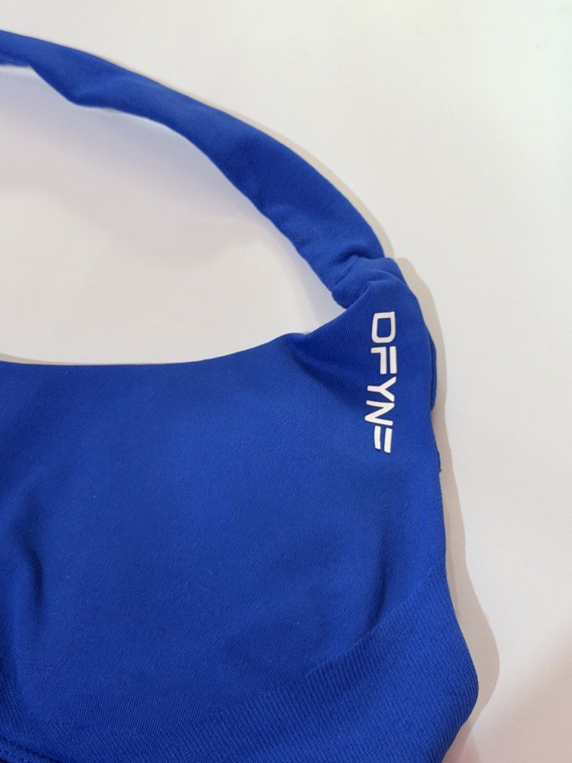 DFYNE Impact Set in Electric Blue (Category: Activewear) located in Paranaque City. Submitted by moonlightgiraffe (Listing ID 1466566522, Image 2). Description: - Brand: DFYNE - Color: Electric Blue - Authentic - Logo with missing line in “E” accidentally put in dryer - XS - Sucat/BGC .