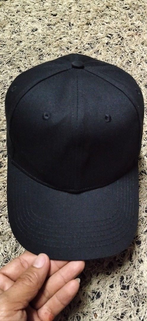 Dickies Black Baseball Cap (Category: Caps & Hats) located in Paranaque City. Submitted by michael-08 (Listing ID 1466756527, Image 2). Description: - Brand: Dickies - Color: Classic black - Design: Embroidered logo patch on the side - Fit: Adjustable strap back closure with metal hardware - Details: Clean panels with stitched eyelets and a curved brim - Condition: Excellent / Brand new DICKIES AUTHENTIC LEGIT ..WALA PO ISSUE LIKE A NEW CONDITION