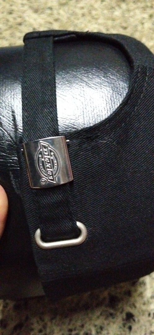 Dickies Black Baseball Cap (Category: Caps & Hats) located in Paranaque City. Submitted by michael-08 (Listing ID 1466756527, Image 3). Description: - Brand: Dickies - Color: Classic black - Design: Embroidered logo patch on the side - Fit: Adjustable strap back closure with metal hardware - Details: Clean panels with stitched eyelets and a curved brim - Condition: Excellent / Brand new DICKIES AUTHENTIC LEGIT ..WALA PO ISSUE LIKE A NEW CONDITION