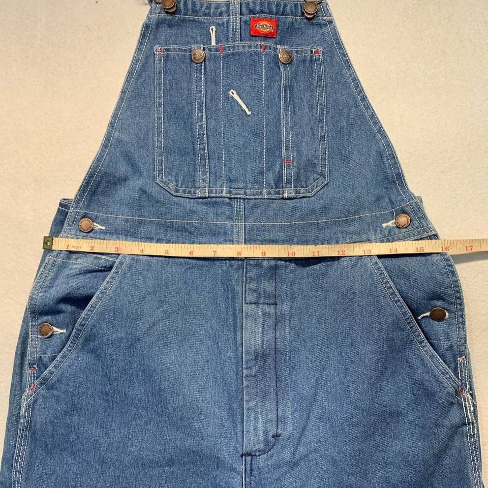 Dickies Denim Overalls Blue Workwear (Category: Jumpsuits) located in Mandaluyong City. Submitted by theroom501 (Listing ID 1466608054, Image 3). Description: Dickies Denim Overalls Blue Workwear Style Code: Size on Tag: Color: Blue Condition: Good pre-owned condition with a heavily distressed vintage look. Flaws/Issues: peeling on the tag. Flat Lay Measurements: Pit to Pit: 32 inches Length: 55 inches Leegopening Length: 8 inches Price: 2500 .