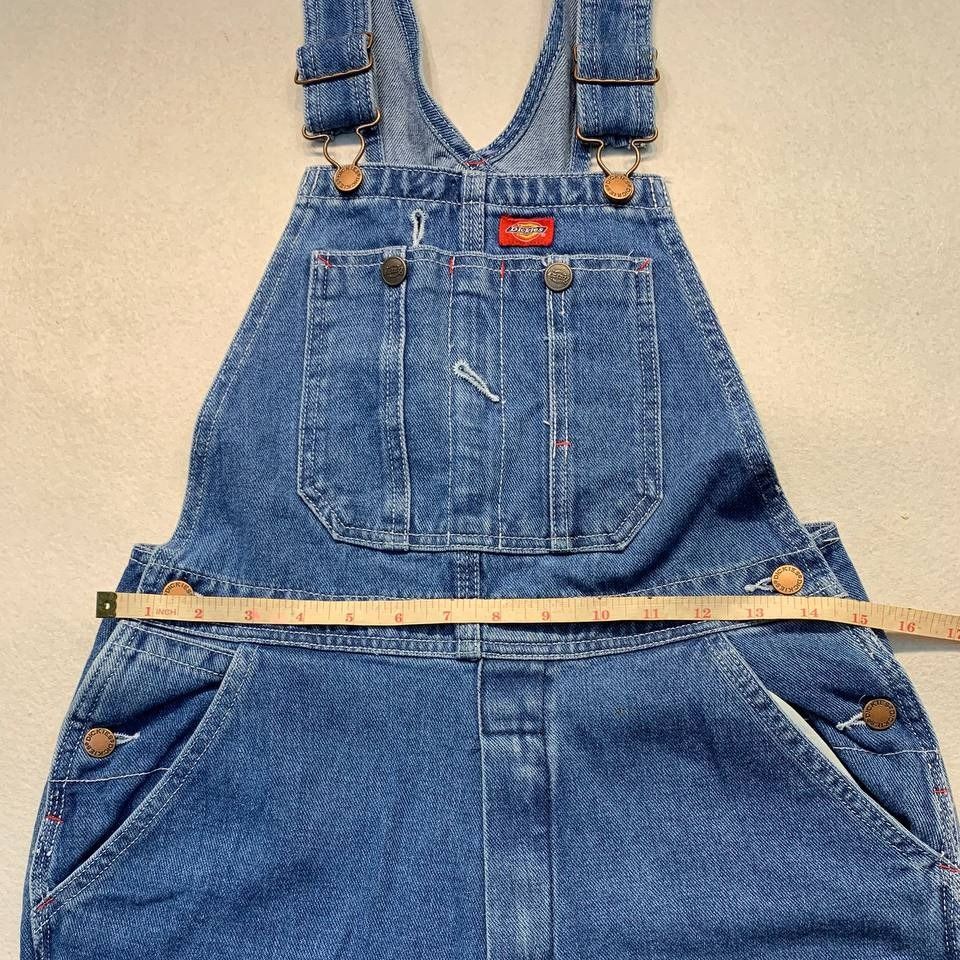 Dickies Denim Overalls Blue Workwear (Category: Jumpsuits) located in Mandaluyong City. Submitted by theroom501 (Listing ID 1466609506, Image 3). Description: Dickies Denim Overalls Blue Workwear Style Code: Size on Tag: Large Color: Blue Condition: Good pre-owned condition with a heavily distressed vintage look. Flaws/Issues: peeling on the tag. Flat Lay Measurements: Pit to Pit: 30 inches Length: 55 inches Leegopening Length: 8 inches Price: 25
