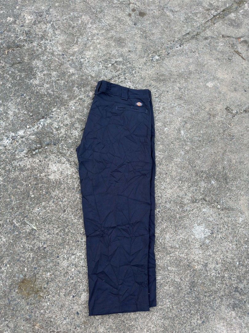 Dickies Slim Fit Navy Work Pants (Category: Trousers) located in Urdaneta. Submitted by goldeneagle-e662 (Listing ID 1466664358, Image 1). Description: - Brand: Dickies - Color: Navy Blue (Dark tone) - Fit: Slim fit - Details: Standard belt loops, rear welt pocket with classic Dickies logo patch, inner waistband label - Style: Clean, versatile, and easy to match with any shirt or hoodie - Condition: Solid daily rotation piece.