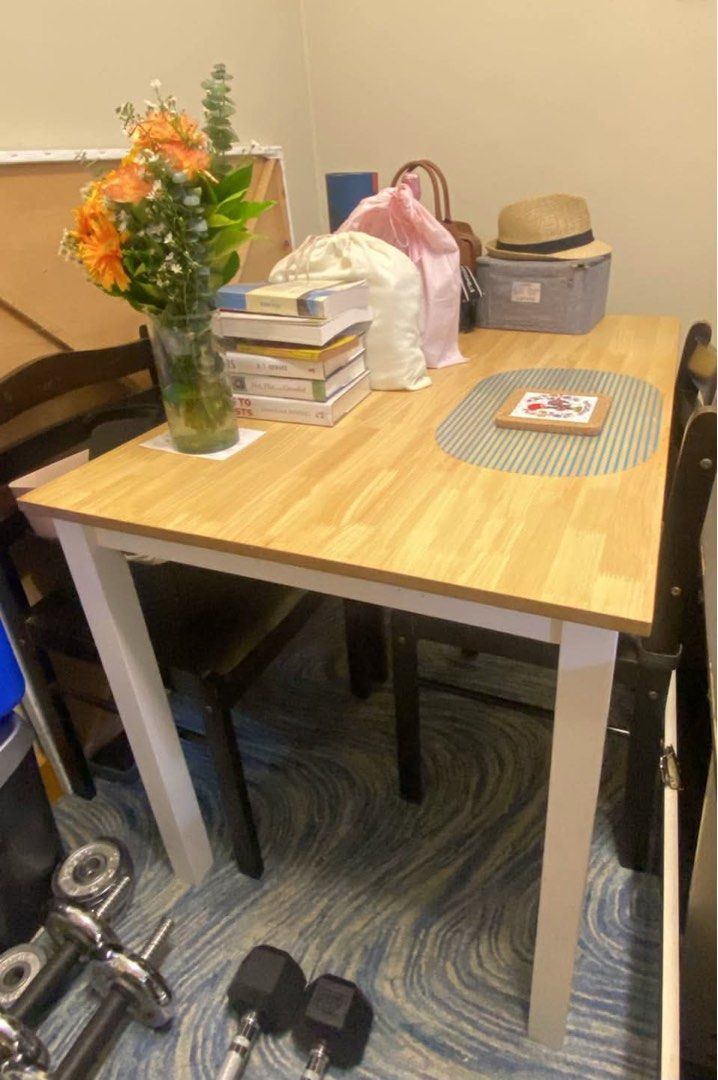 Dining set (table 4 chairs) (Category: Tables & Sets) located in Manila. Submitted by cleankween (Listing ID 1466701682, Image 1). Description: For rehoming Dining table with 4 chairs 110cm x 70cm x 73cm Length Width height Vinyl pine top Table with white painted legs Includes 4 pcs black chairs RFS: Decluttering Mode of payment: BPI, GCASH Pick-up location: Acacia Estates, Taguig (exact address will be provided once paid) Reminders: Stuff on tab