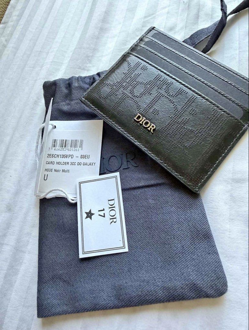 Dior Galaxy (Category: Luxury Bags & Wallets) located in Dasmarinas. Submitted by bokcano1932 (Listing ID 1466590281, Image 1). Description: Authentic Dior galaxy card holder 6 card slots 1 main cash/card slot Like new Dust bag and care carda only Meet up Starbucks Vermosa Shipping c2o buyer.