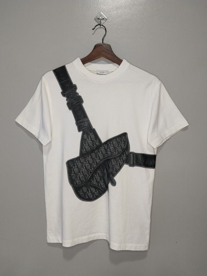 Dior T-shirt (Category: Tshirts & Polo Shirts ) located in Bago City. Submitted by classic_picked_up (Listing ID 1466672566, Image 1). Description: excellent issue: slight bacon ang neck 9.5/10 color rate 18.5 by 26.5.