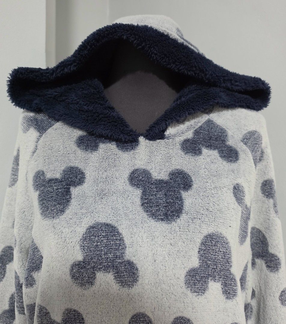 Disney Mickey Mouse Fuzzy Hooded Sweatshirt (Category: Coats, Jackets and Outerwear) located in Paranaque City. Submitted by franinnashop (Listing ID 1466622713, Image 3). Description: DECLUTTER MED TO LARGE PARANAQUE CITY - Super soft and cozy Mickey Mouse fuzzy hoodie - Light grey base with contrasting dark navy blue hood and front pocket - Allover Mickey Mouse head pattern - Made from 100% polyester faux fur material for ultimate warmth - Size