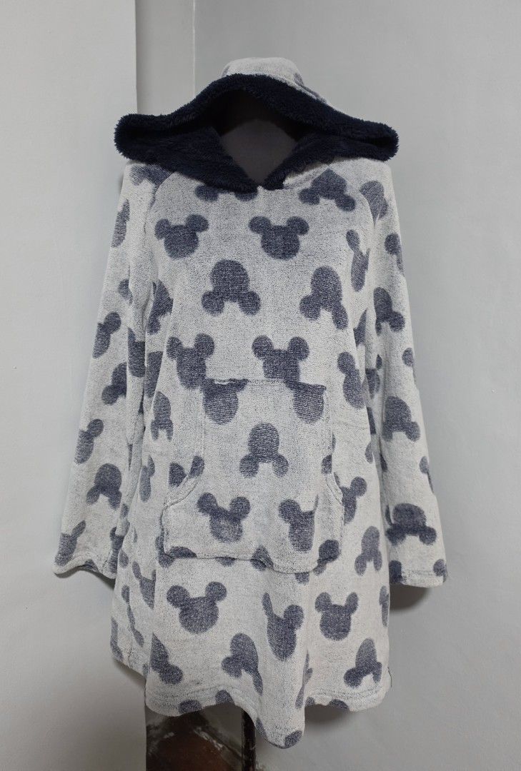 Disney Mickey Mouse Fuzzy Hooded Sweatshirt (Category: Coats, Jackets and Outerwear) located in Paranaque City. Submitted by franinnashop (Listing ID 1466622713, Image 2). Description: DECLUTTER MED TO LARGE PARANAQUE CITY - Super soft and cozy Mickey Mouse fuzzy hoodie - Light grey base with contrasting dark navy blue hood and front pocket - Allover Mickey Mouse head pattern - Made from 100% polyester faux fur material for ultimate warmth - Size