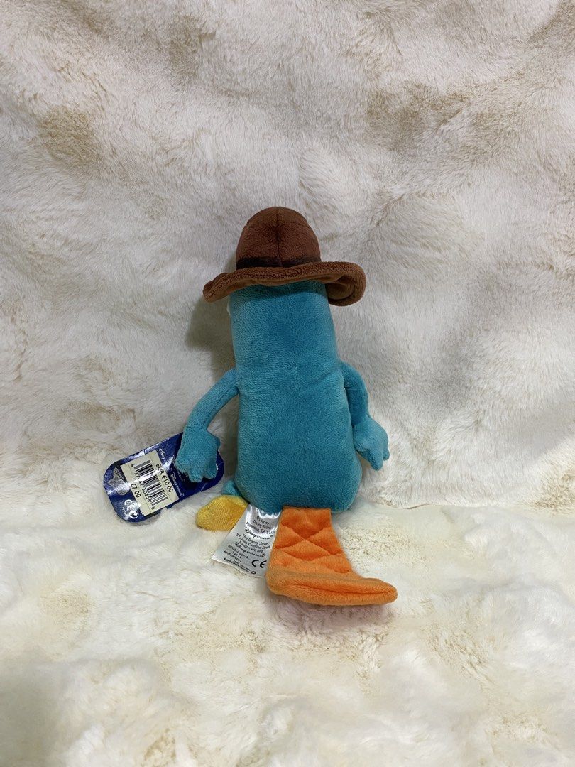 Disney’ Phineas and Ferb “Agent P.” (Category: Plushies & Soft Toys) located in Kalibo. Submitted by ollie_stuffshop (Listing ID 1466741541, Image 3). Description: 13cm x 13.5cm Before you send your inquiries: ❗️Last Price is already posted ❗️Manage your expectations, WYSIWYG ❗️May need washing ❗️Dropoff is every Wednesday & Sunday - Semi-aquatic, Egg-laying mammal of action .