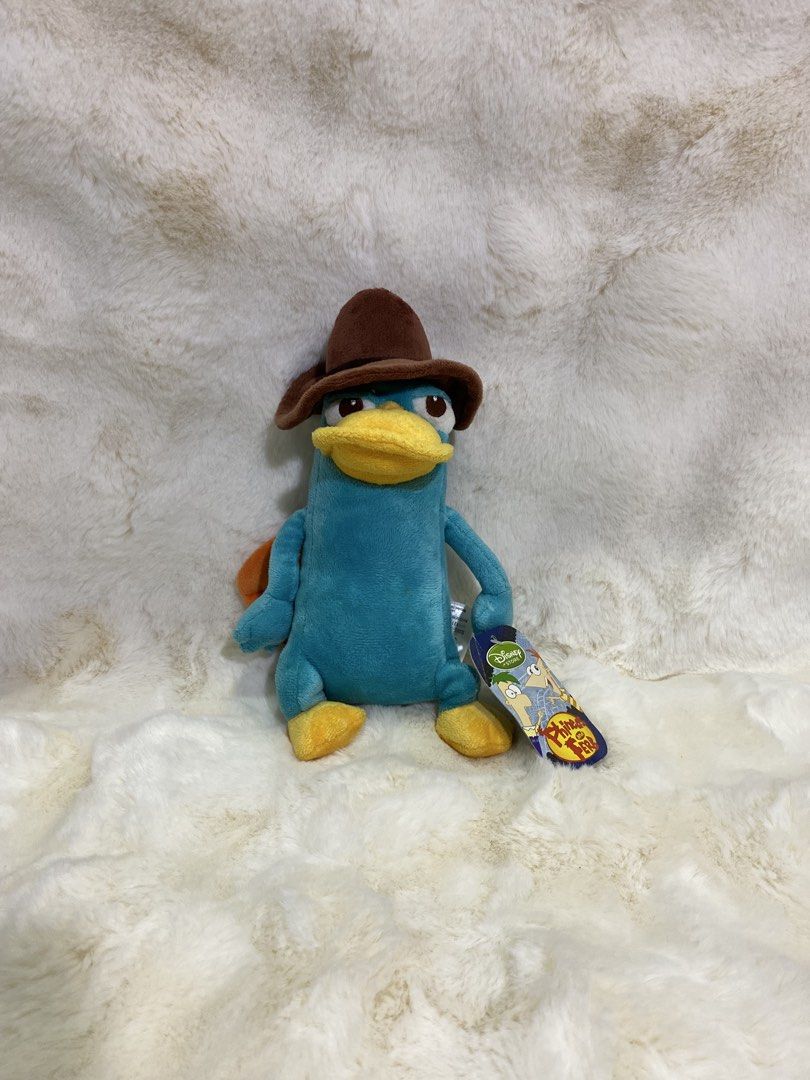 Disney’ Phineas and Ferb “Agent P.” (Category: Plushies & Soft Toys) located in Kalibo. Submitted by ollie_stuffshop (Listing ID 1466741541, Image 1). Description: 13cm x 13.5cm Before you send your inquiries: ❗️Last Price is already posted ❗️Manage your expectations, WYSIWYG ❗️May need washing ❗️Dropoff is every Wednesday & Sunday - Semi-aquatic, Egg-laying mammal of action .