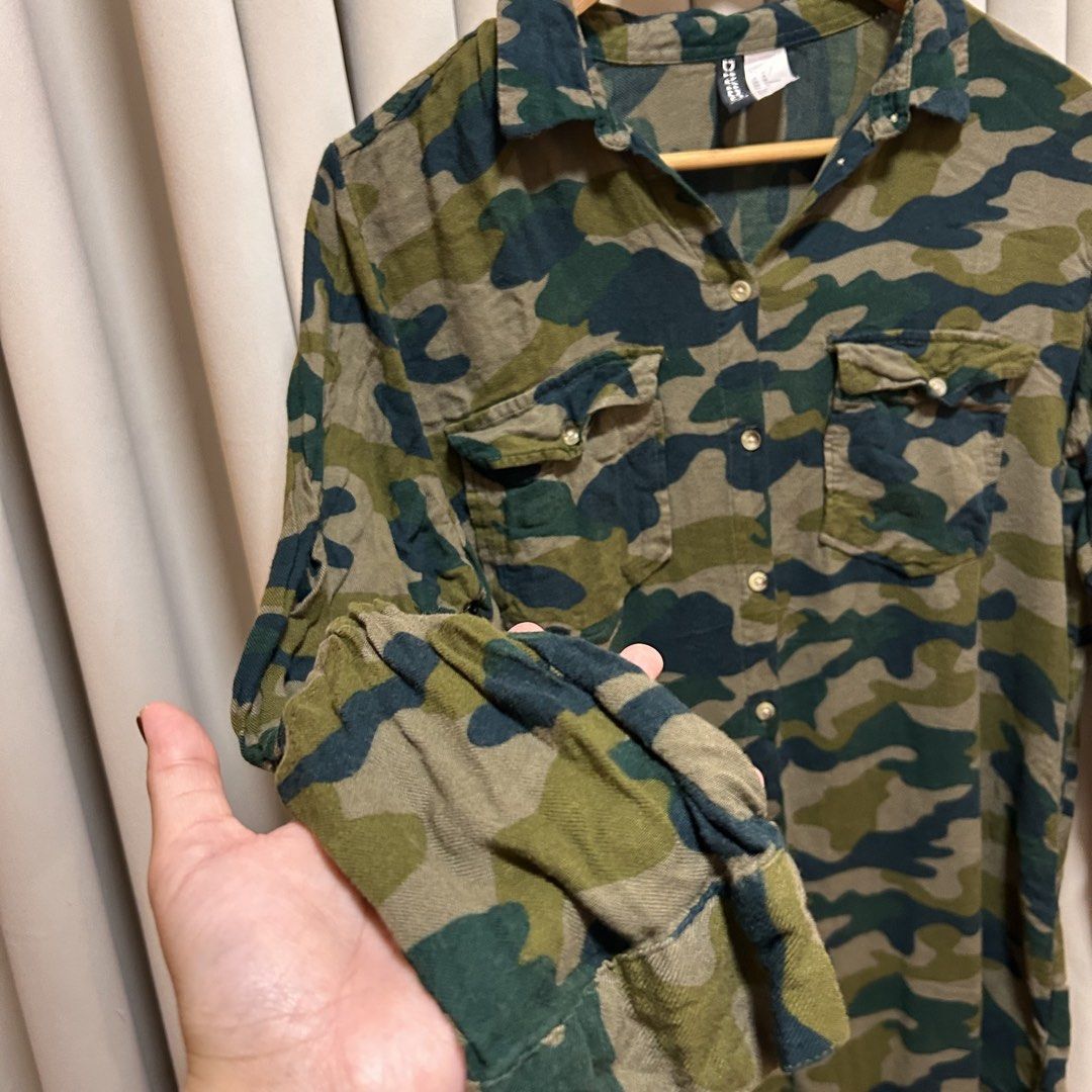 Divided by H&M Camouflage Longsleeves (Category: Shirts) located in Rizal. Submitted by from99abovecloset (Listing ID 1466597079, Image 3). Description: CODE:148 Size: L Armhole (laid flat):10” Bust (around): 46” Length (laid flat): 32” Cotton | loose | like new.