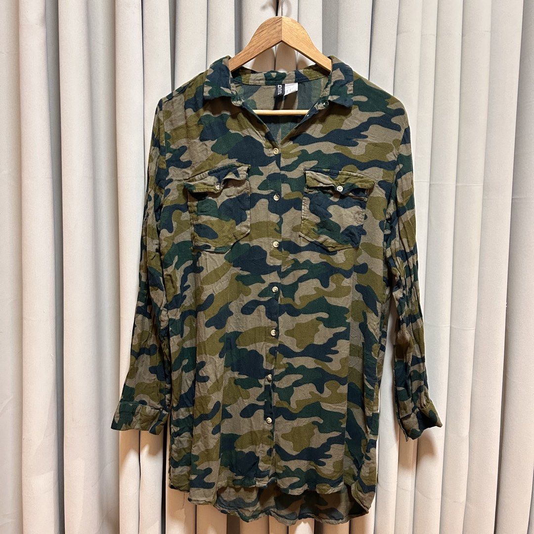 Divided by H&M Camouflage Longsleeves (Category: Shirts) located in Rizal. Submitted by from99abovecloset (Listing ID 1466597079, Image 1). Description: CODE:148 Size: L Armhole (laid flat):10” Bust (around): 46” Length (laid flat): 32” Cotton | loose | like new.