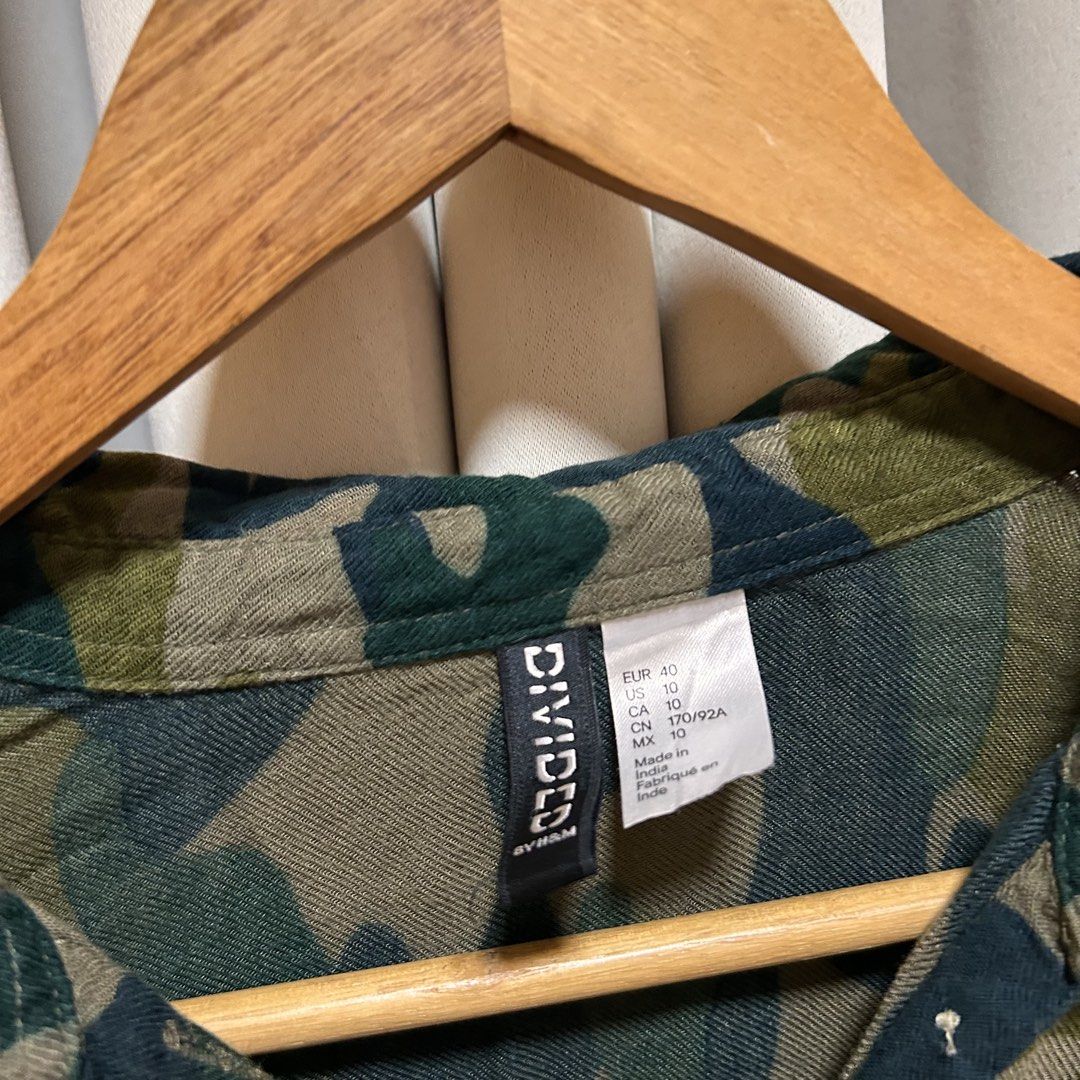 Divided by H&M Camouflage Longsleeves (Category: Shirts) located in Rizal. Submitted by from99abovecloset (Listing ID 1466597079, Image 2). Description: CODE:148 Size: L Armhole (laid flat):10” Bust (around): 46” Length (laid flat): 32” Cotton | loose | like new.