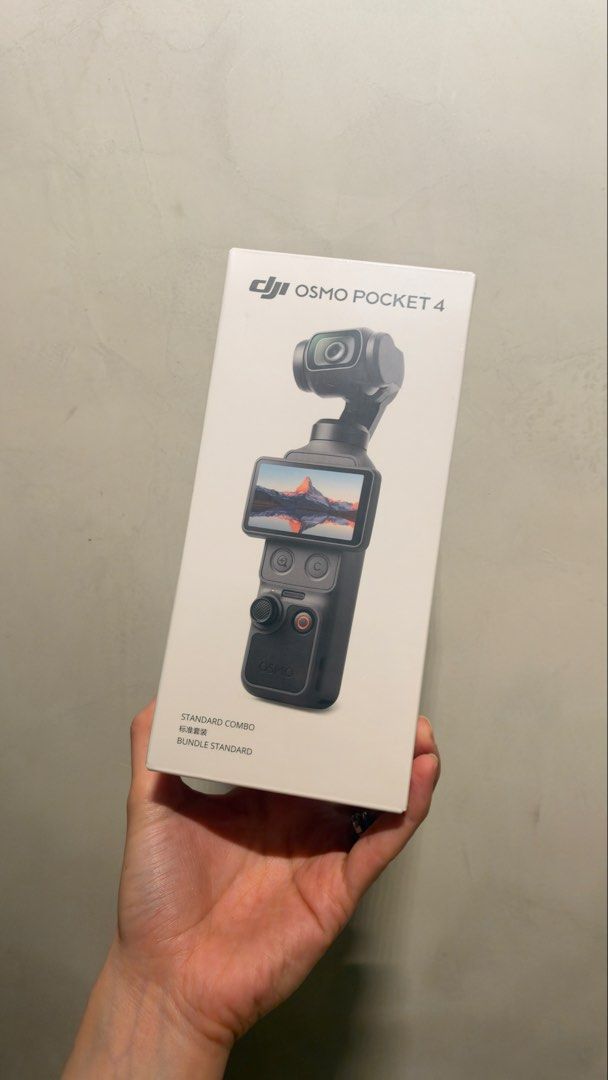 DJI Osmo Pocket 4 Standard Combo (Category: Cameras) located in Pasig City. Submitted by mariadh1995 (Listing ID 1466702594, Image 1). Description: - Condition: Brand new, factory-sealed box with unopened plastic wrap - Camera: 1-inch CMOS sensor for stunning 4K video recording - Stabilization: Advanced 3-axis mechanical stabilization for ultra-smooth footage - Storage: Built-in storage included - Perfect for: Grab-and-go vlogging and content cre