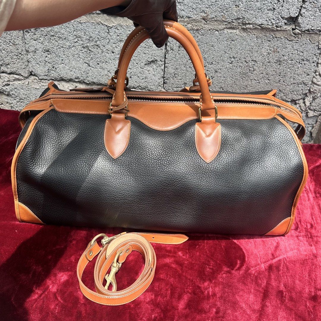 Dooney & Bourke All weather weekender bag. (Category: Luxury Bags & Wallets) located in Cagayan de Oro. Submitted by kjcartier26 (Listing ID 1466632920, Image 3). Description: Authentic Dooney & Bourke Bag. 🇯🇵✨ - 56k in peso for this preloved bag. 😱😱 - In excellent condition. - With strap, Adjustable and Flawless - Clean inside/Outside, Working zippers. .
