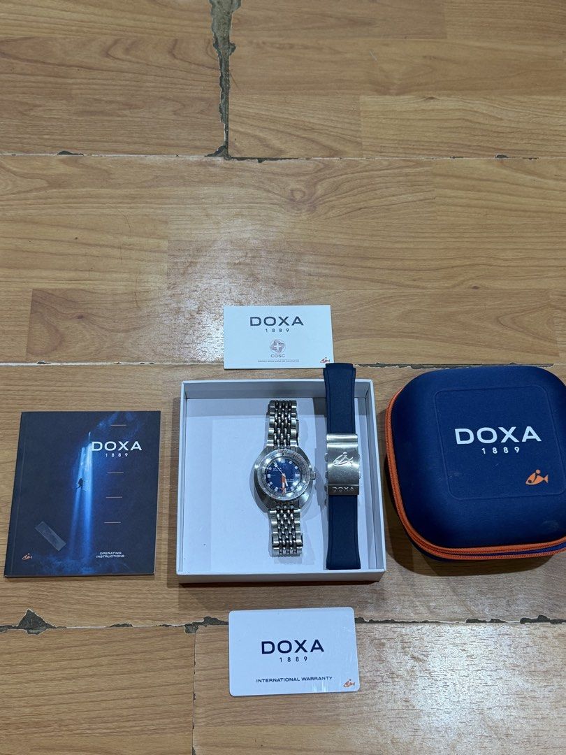 Doxa Sub 300 Caribbean (Category: Men's Watches) located in Butuan. Submitted by swiftflower.6836d6 (Listing ID 1466655055, Image 3). Description: MOVEMENT Swiss mechanical automatic, self-winding, COSC certified Chronometer Power reserve 38 hours CASE Stainless steel case Diameter 42.50 mm x 45.00 mm Height 13.40 mm Screw-down crown Water resistance 30 ATM / 300 meters / 984 feet Stainless steel, screw down case back In good condition. Purchased