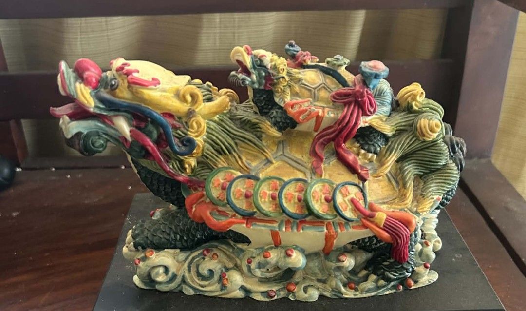Dragon Turtle with Coins and Baby Turtle Statue (Category: Figurines & Statues) located in Makati City. Submitted by YSL80022 (Listing ID 1466622204, Image 1). Description: - Traditional Feng Shui Dragon Tortoise figurine, perfect for home or office decor - Features a majestic dragon head, tortoise shell carrying ancient coins, and a baby turtle on the back - Heavy, premium resin/stone material with intricate hand-painted details (greens, reds, g