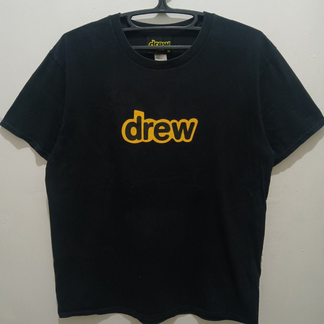 DREW Logo Shirt (Category: Shirts) located in Caloocan City. Submitted by jaychingsss (Listing ID 1466634747, Image 1). Description: Drew Logo Shirt - 180 20x27 No side stitch Color Rate: 9.5/10 No issue NEED WASH.