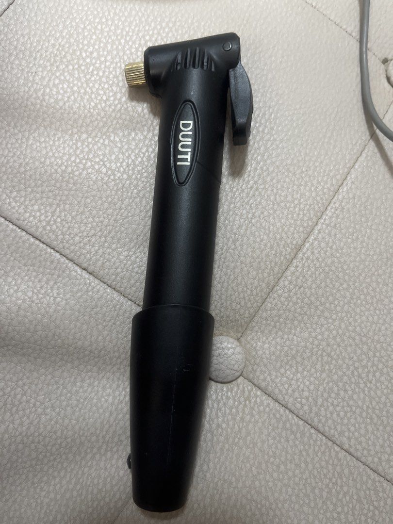 DUUTI Portable Mini Bicycle Hand Pump (Category: Bicycles) located in Pasig City. Submitted by jnzmrq1003 (Listing ID 1466608419, Image 2). Description: - Brand: DUUTI portable mini hand pump in sleek black - Ultra-compact size: Easy to toss in a backpack or mount directly on your bike frame - Secure fit: Standard nozzle connection with a convenient locking lever on top - Emergency ready: A reliable tool to get you back on the road quickly during