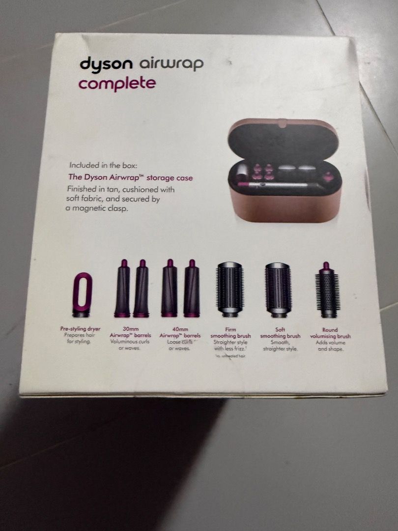 Dyson Airwrap Complete Multi-Styler Styling Set (Category: Hair) located in Cebu City. Submitted by hethlion (Listing ID 1466718743, Image 2). Description: - Authentic Dyson Airwrap Complete set in signature tan storage case; sealed and never been used - Includes pre-styling dryer, 30mm and 40mm curling barrels - Comes with firm smoothing brush, soft smoothing brush, and round volumising brush - Dries, curls, and smooths hair without extreme heat