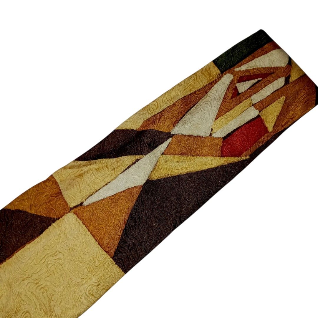 Earth Tone Abstract Geometric Textured Tie (Category: Ties) located in Abucay. Submitted by gibzzz123 (Listing ID 1466643949, Image 3). Description: • All items are ON HAND and ready to be shipped/picked up. • Items are preloved/ukay, so please expect minimal signs of usage unless stated otherwise. • No major issues — good condition unless otherwise indicated in the listing. • Actual color may slightly vary due to lighting and screen settings. • 