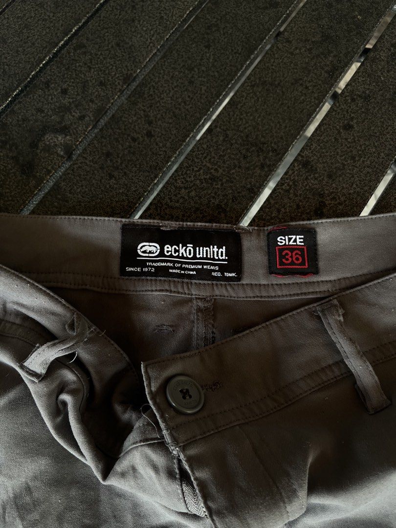 Ecko Unltd Cargo Shorts (Category: Shorts) located in Tuguegarao City. Submitted by josh_the_thrift (Listing ID 1466570360, Image 3). Description: - Brand: Ecko Unltd - Size: 36x32 - Color: Grey - Features: Multiple utility pockets with zippers on the sides, iconic rhino logo patch on the left leg - Condition: may himulmol na part.