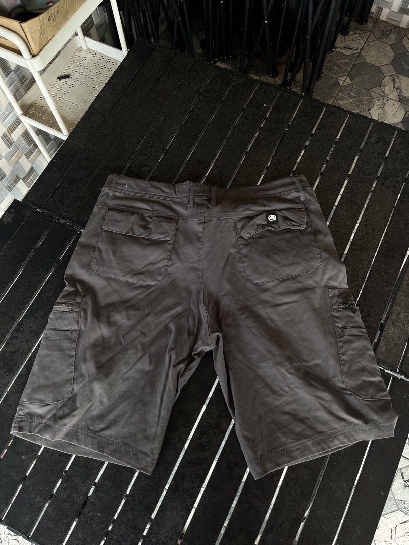 Ecko Unltd Cargo Shorts (Category: Shorts) located in Tuguegarao City. Submitted by josh_the_thrift (Listing ID 1466570360, Image 2). Description: - Brand: Ecko Unltd - Size: 36x32 - Color: Grey - Features: Multiple utility pockets with zippers on the sides, iconic rhino logo patch on the left leg - Condition: may himulmol na part.