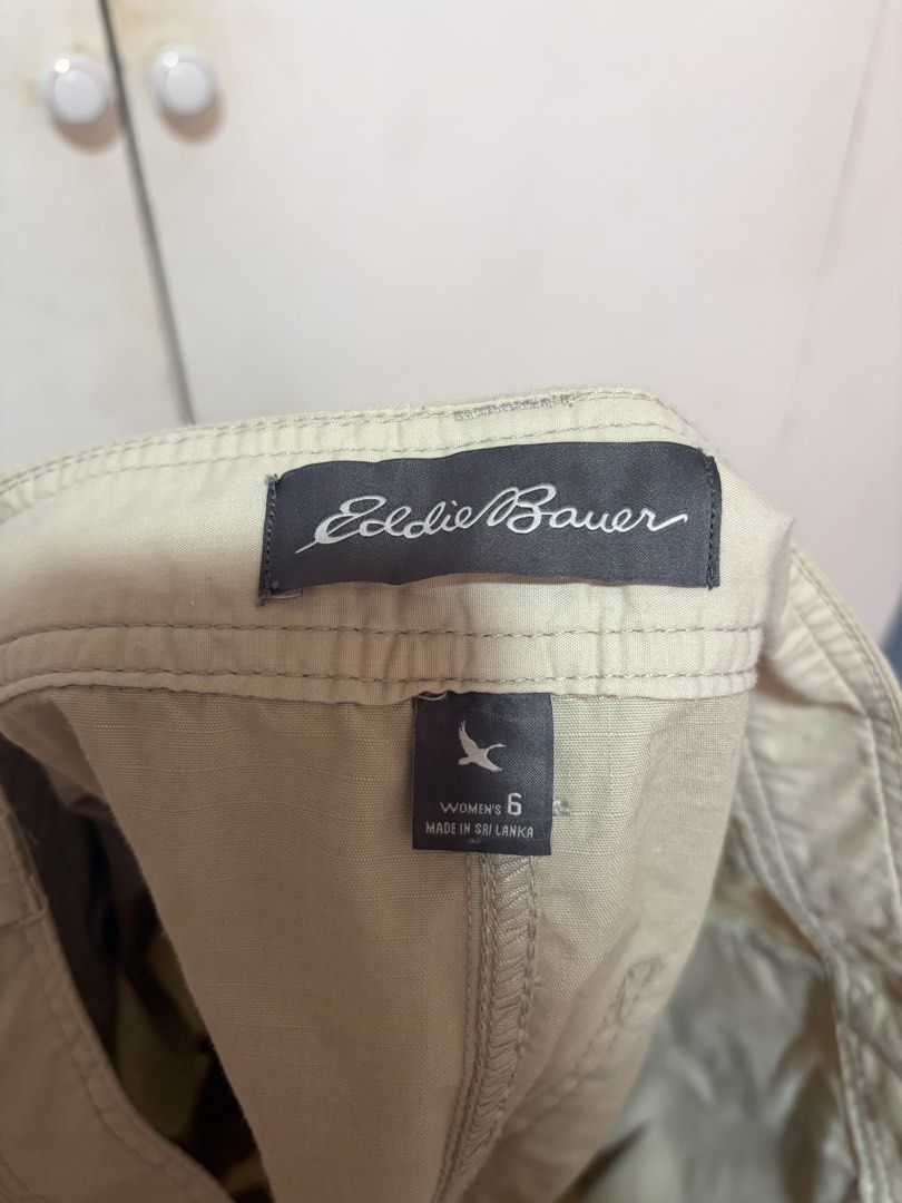 Eddie Bauer Khaki Cargo Skirt (Category: Skirts) located in Dasmarinas. Submitted by luvaide (Listing ID 1466599418, Image 3). Description: - Brand/Style: Eddie Bauer Women's Cargo Skirt - Size: 6 - Color: Classic khaki beige - Material: Sturdy utility-style fabric - Features: Button and zipper fly, front slash pockets, side cargo pocket, two button-flap back pockets - Condition/Use: Great neutral piece for casual wear, hiking, and outdoor outing
