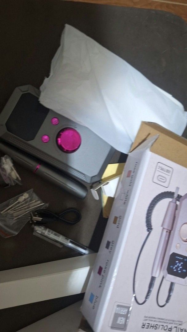 Electric Nail Polisher Drill Set with Bits (Category: Hands & Nails) located in Quezon City. Submitted by nobledeer.dc87f4 (Listing ID 1466623493, Image 3). Description: - Cute pastel electric nail polisher kit - Ideal for home manicures and pedicures - Includes main console unit, handpiece, and charging cable - Complete set of interchangeable drill bits and sanding bands included - Compact and lightweight design - Neatly organized in the origina